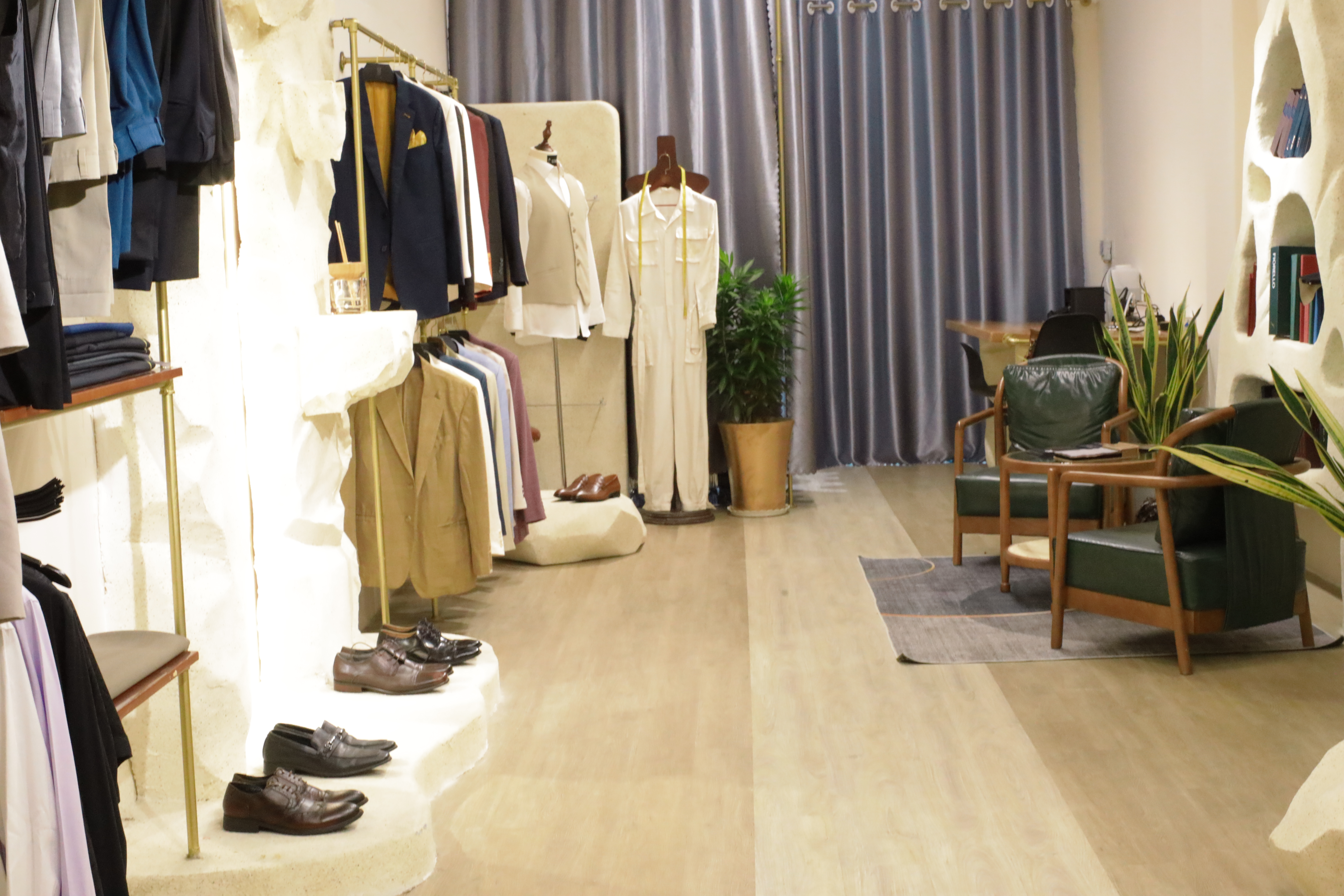 S.T Tailor showroom interior with garment rail | Không gian S.T Tailor với giá treo trang phục